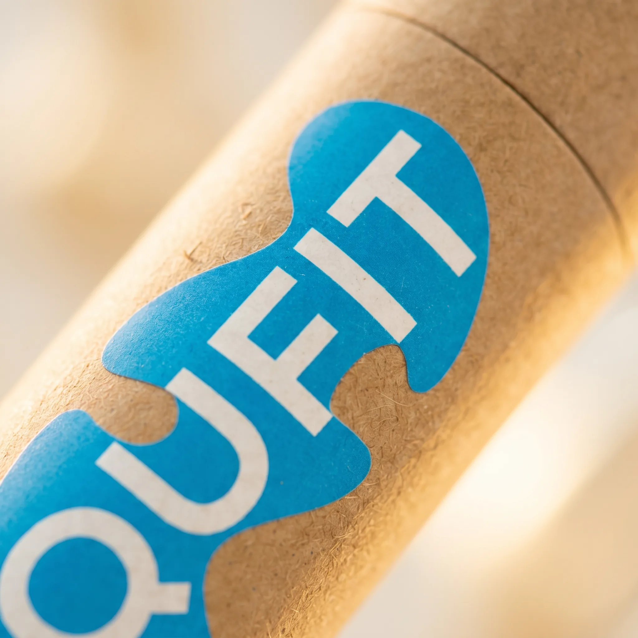 Qufit Stick — wax texture close-up
